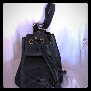 Vintage Dooney and Bourke sling backpack